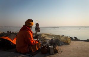 An Indian Sadhu on the banks of river Ganges in varanasi
